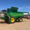 2016 John Deere S680 Header and d65 macdon 