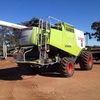 Claas 750 header with 40ft Macdon Draper front  