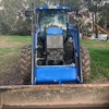 2011 New Holland 6050 Tractor with FEL & Bucket