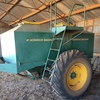 John Deere 40 Foot 12 inch space air seeder with Simplicity Air Cart.