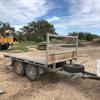 Flat Top Tandem Trailer with stock crate & sides