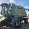 John Deere 9610 header and 930F front