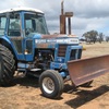 Ford 7700 Tractor with Forks