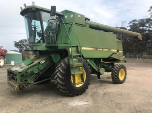 1995 John Deere header with 30ft Front & Canola Front
