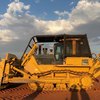 Komatsu Bulldozer with Gessner Stick rake and tree spear