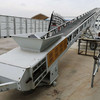 New unused Portable radial grain conveyor stacker, 30in*60ft conveyor, belt with 30inch, drive power :7.5kw, transport length 18000mm,weight 3.5 tons, 460v 50hz power.