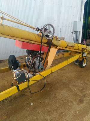 Keogh 55ft by 9inch auger with 35hp Kohler motor, power wheel and electric winch