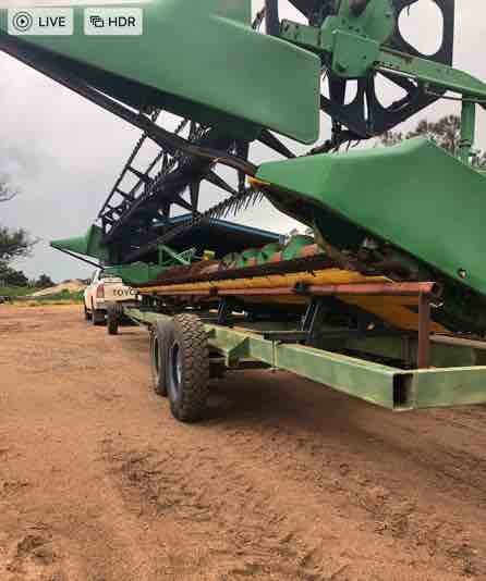 John Deere 930F Front on Trailer