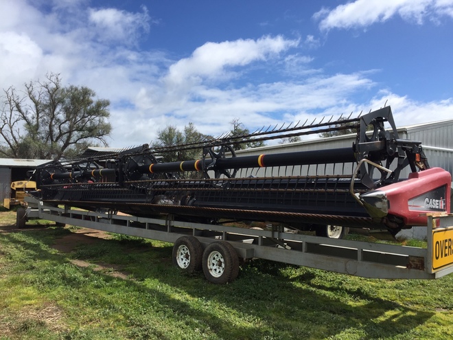 2010 CASE IH 8120 HEADER PLUS 2152 40FT MACDON FRONT WITH TRAILER.                PRICE REDUCTION!!!!  PRICE REDUCTION!!!