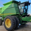 JOHN DEERE 9750 STS WITH 936D 36 FOOT DRAPER FRONT ON TRAILER FOR SALE