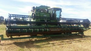 **PRICE NEGOTIABLE** John Deere 8820 Header with Front & Trailer