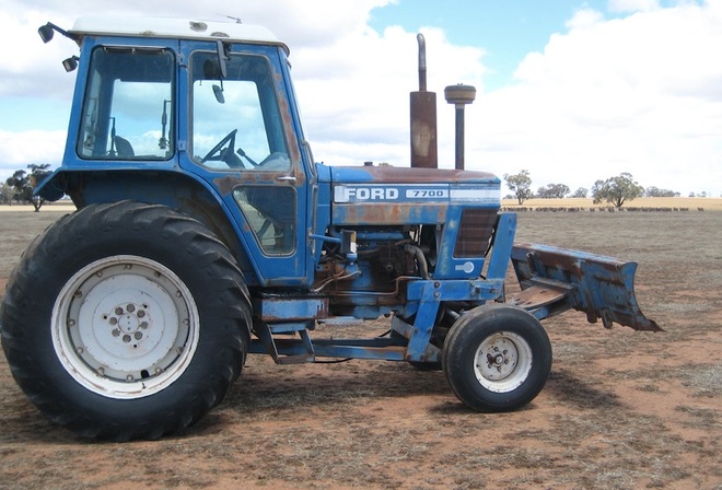 Ford 7700 Tractor with Forks