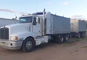 Under Auction - 2004 Kenworth 404 Truck with Hamelex Bin and Dog - 2% Buyers Premium On All Lots