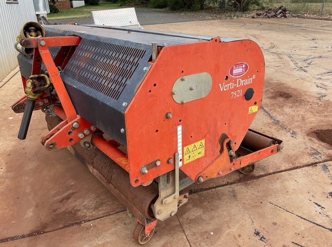 Verti-Drain 7521. 8ft wide