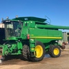 John Deere 9770 with 2016 40’ D65 MacDon Front on Coolaman Trailer