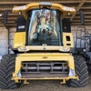 CX 860 New Holland Harvestor with 40' Honeybee Draper Front & Trailer