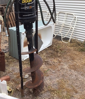 hydraulic post digger