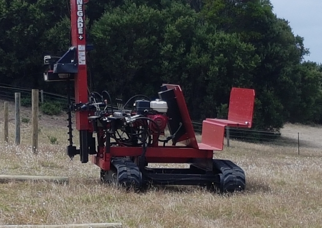 2018 Wheatheart Renegade Post Driver on tracks.
