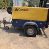 Compair C38 130 cfm at 102 psi pressure on a 2 wheel road tow chassis with road lights Ex Govt machine with genuine 204 hrs