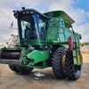 JOHN DEERE 9750 STS WITH 936D 36 FOOT DRAPER FRONT ON TRAILER FOR SALE