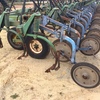 John Deere 40 Foot 12 inch space air seeder with Simplicity Air Cart.