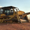 Komatsu Bulldozer with Gessner Stick rake and tree spear