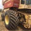 New Holland TR85 Header Harvester (In working Condition) + one available for parts (front & trailer included)