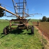 Traveling boom irrigator
