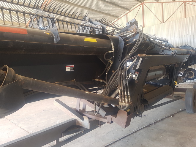 John Deere 9650 with MacDon 973 Front