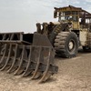 1985 Caterpillar 988B Wheel Loader with 24 foot Stick Rake