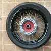 Motorbike front and rear wheels and road tyres