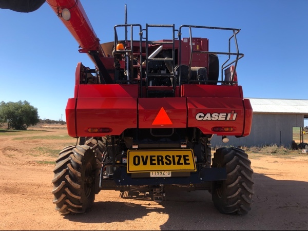 CNH 7120 Harvester and 40” 2152 comb
