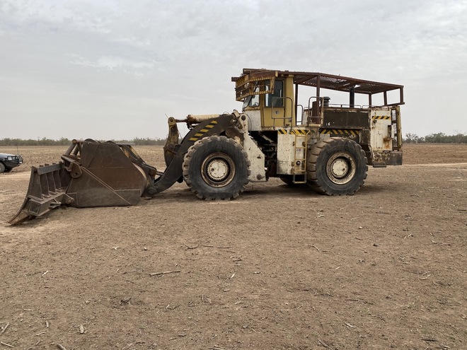 1985 Caterpillar 988B Wheel Loader with 24 foot Stick Rake