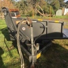 Hydraulic square and round bale feeder