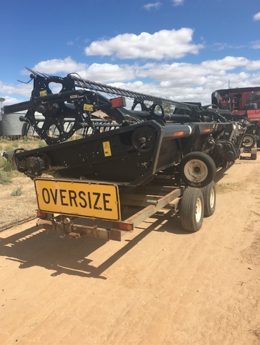 Under Auction (A125) - 2010 Case 8120 IH Header with 45' MacDon Front