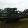 John Deere 9600 Header with 30ft 930 Front on Trailer