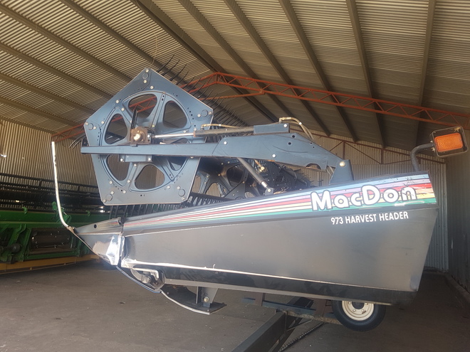 John Deere 9650 with MacDon 973 Front