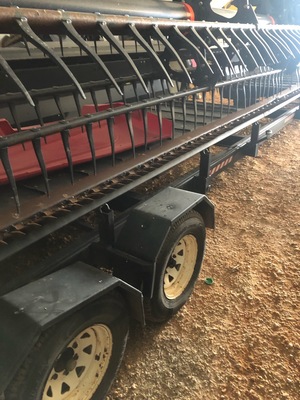 2014 D65 Macdon 30ft double knife drive windrowing front