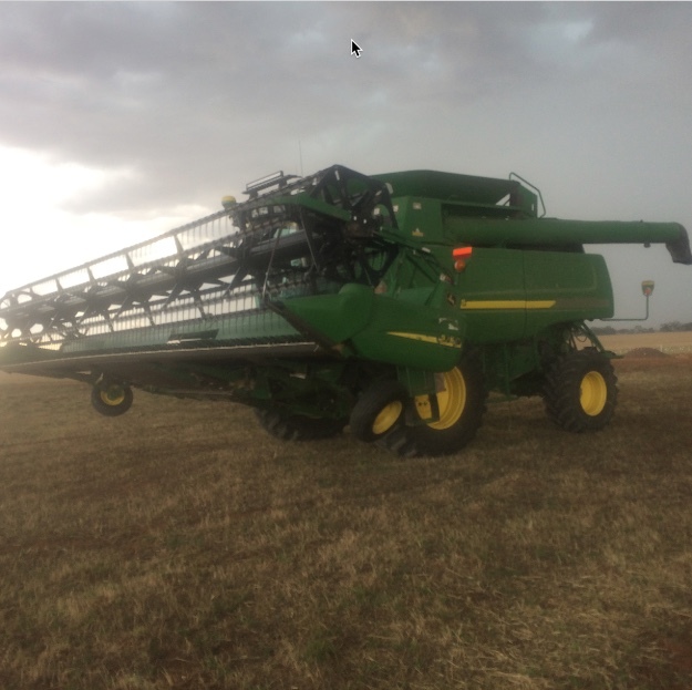 John Deere 9860 with 936 D Front and 914 Pickup front 