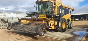 Cat Lexion 480 Header With 36ft 972 MacDon and 14ft phillips pick up