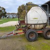 1997 MacDon 3000 High-arch Windrower & Spray Tank