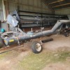 1997 MacDon 3000 High-arch Windrower & Spray Tank