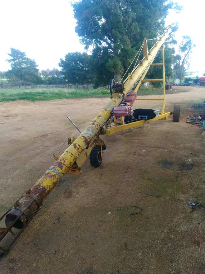 Keogh 55ft by 9inch auger with 35hp Kohler motor, power wheel and electric winch 