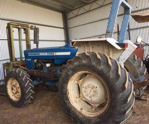 Ford 5600 FWA Tractor with Forks