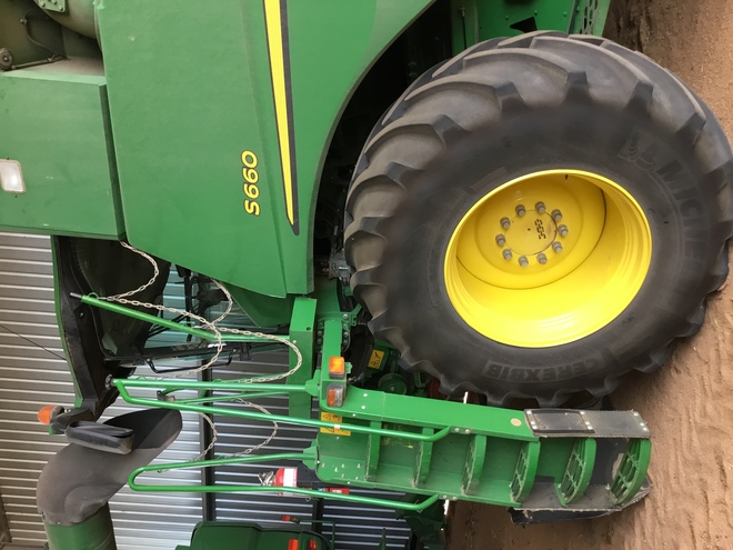 John Deere S660 with or without 630D platform and trailer.