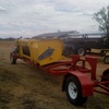 2010 Phillips Rollerdown Pickup Canola Front with trailer