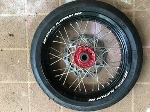 Motorbike front and rear wheels and road tyres