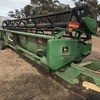 John Deere 9610 header and 930F front