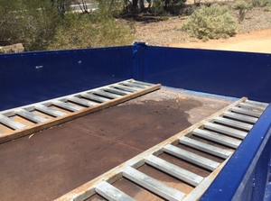 Tandem Axle Tipping Trailer with Toolboxes and Carry Frames