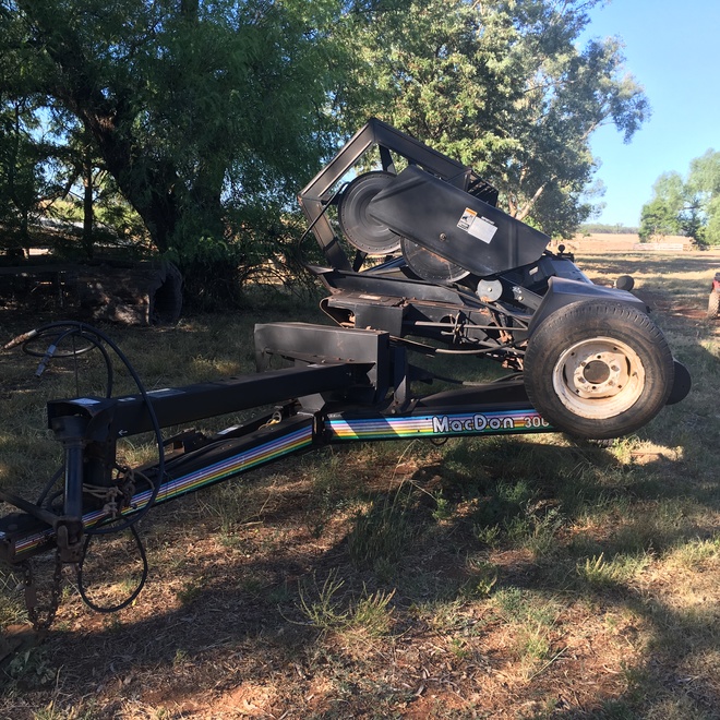 25ft MacDon 3000 Windrower